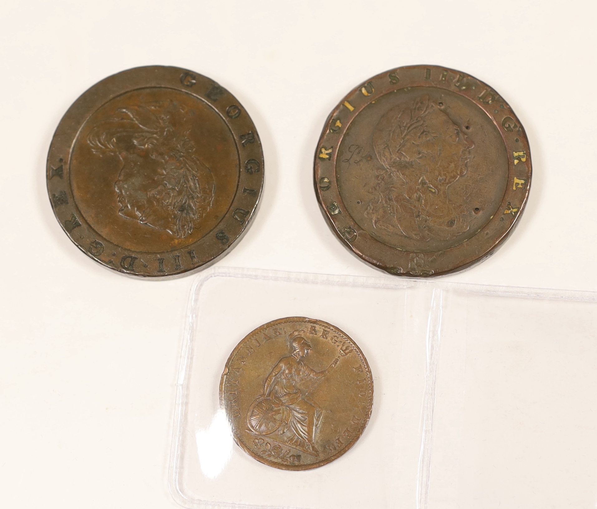 British coins, A George III cartwheel twopence, about VF, another in poor condition and and Victoria halfpenny, 1855, edge nicks otherwise VF